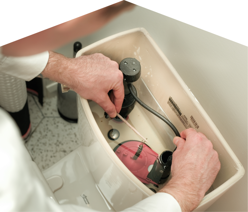 Moore & Russell tra plumbing specialist adjusts internal components of a toilet tank, with tile flooring visible in the background. Moore & Russell plumbing specialist adjusts internal components of a toilet tank, with tile flooring visible in the background.