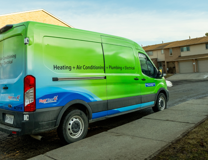 Moore & Russell service van with HVAC, plumbing, and electrical branding parked in a suburban neighborhood, promoting local trust. Moore & Russell service van with HVAC, plumbing, and electrical branding parked in a suburban neighborhood, promoting local trust.