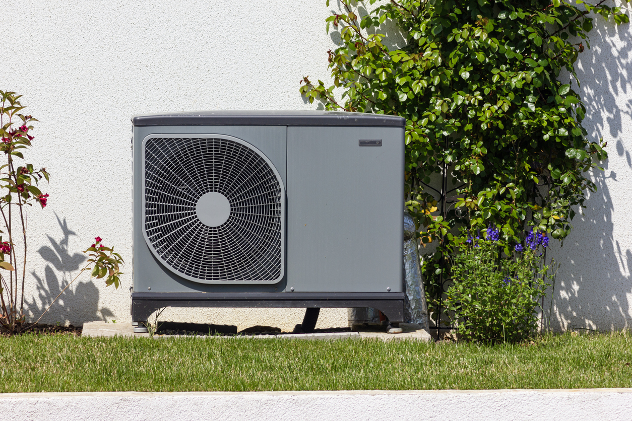 heat pump in a new building area with modern house facades heat pump in a new building area with modern house facades